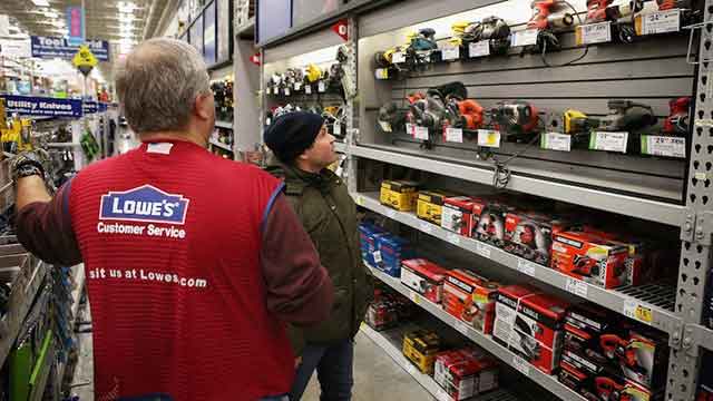 Lowe's Employee helping a customer 