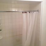 Clean Bathroom With Shower Curtain