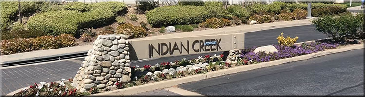 Sign in front of the Community Of Indian Creek