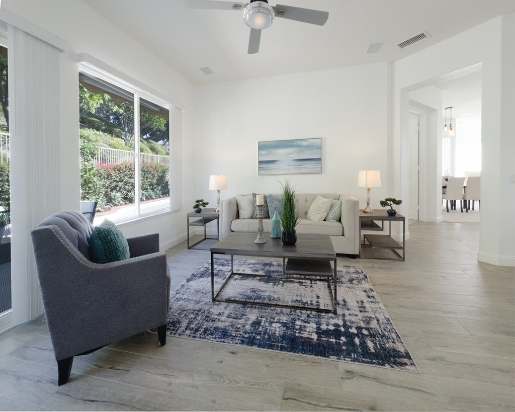 A living room with a couch and a table